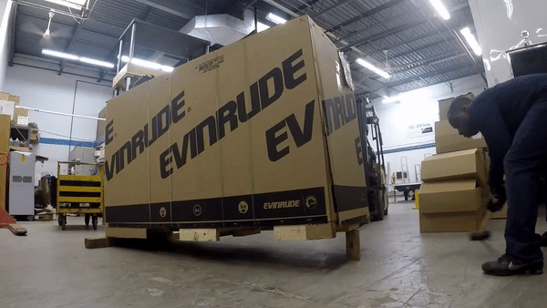 Animated image of an edge drop test on an Evinrude motor box.
